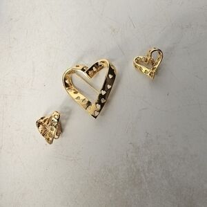 Vintage gold tone heart Brooch with cutout hearts‎ and matching clip on earrings